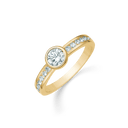 8 kt. guld ring 1 stor rund med 6 syntetiske cubic zirconia og uden om på skinnen på begge sider.