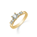 14 kt. guld ring med 1 stor forhøjet og 4 små syntetisk cubic zirconia i 4 grabber.