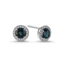 14kt. GRACE Øreringe med rund londonblå topas 5mm + 0,18ct. W-si