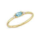 14kt. PETIT ring med oval blå topas og 2 x 0,025 ct. W-si
