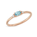 14kt. PETIT ring med oval blå topas og 2 x 0,025 ct. W-si