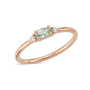14kt. PETIT ring med oval grøn safir og 2 x 0,025 ct. W-si