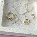 Tynd 8 karat guld alliancering m. zirkonia