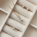 Ring 4 grabber cubic zir. 8 kt.