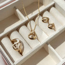 Bred og snoet 8 karat guld ring